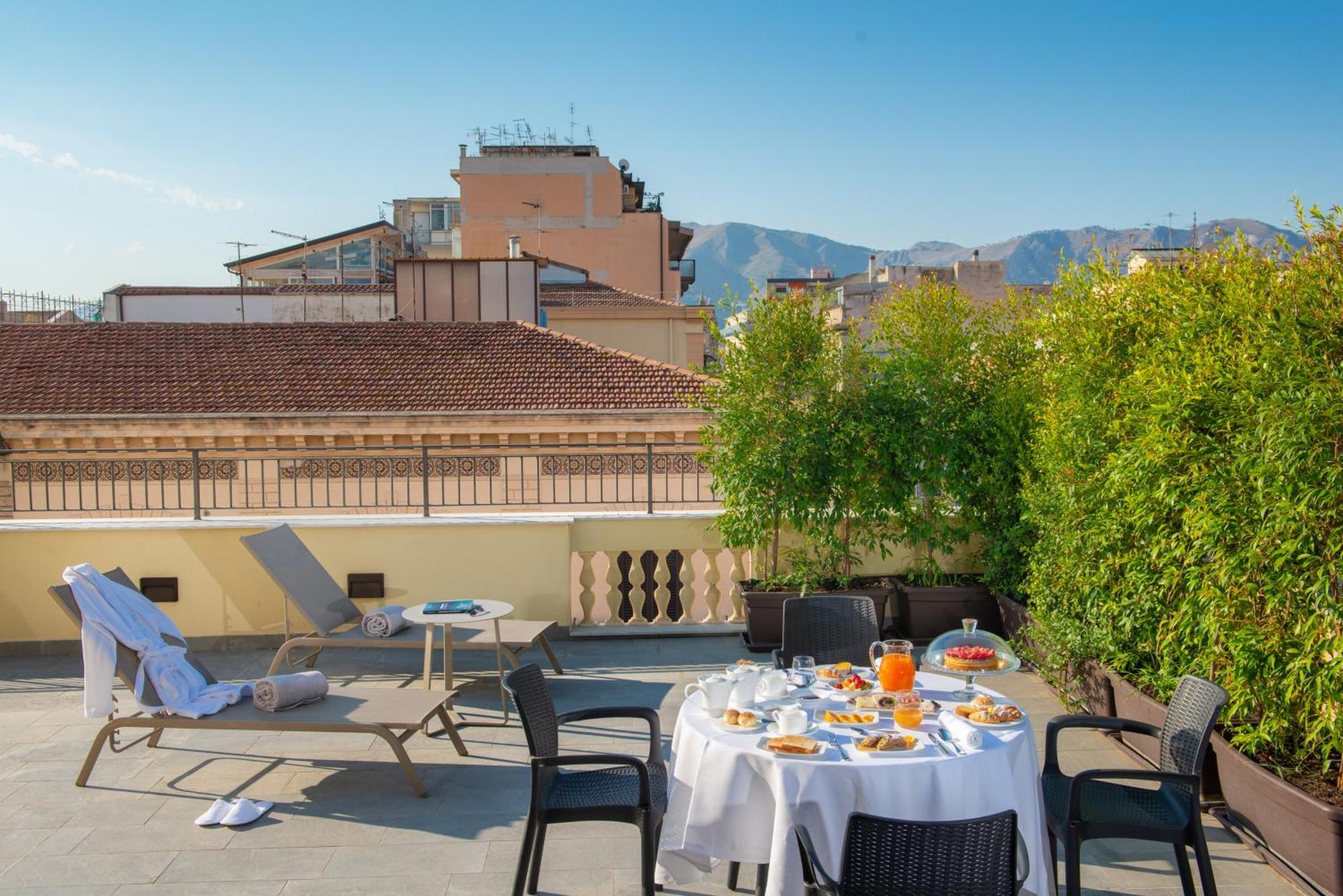 Grand Hotel Et Des Palmes Palermo Bagian luar foto Rooftop terrace